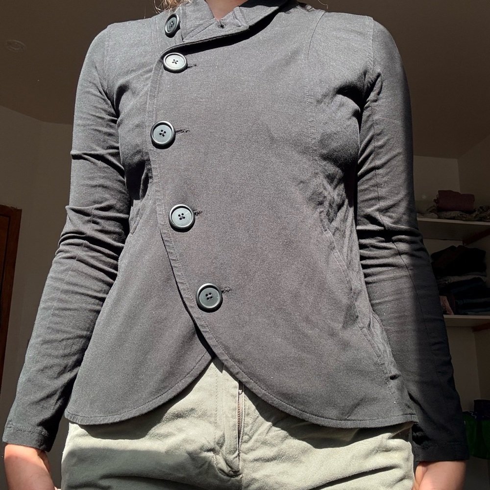 Asymmetrical business top